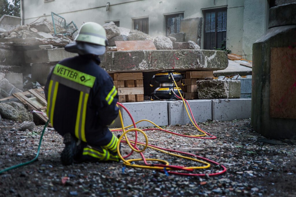 Firefighter using lifting bags